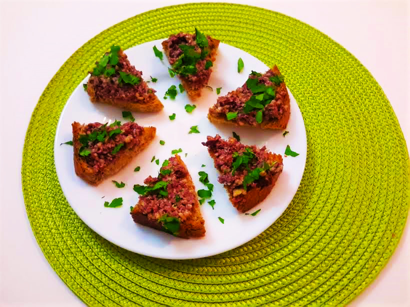 Bruschetta With Black Olive Pesto Top