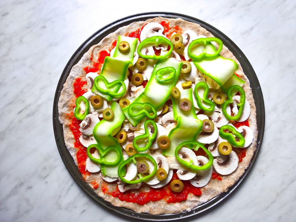 Vegan-pizza-with-zucchini-parsley-peppers-and-olives